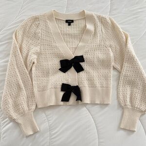 Express Cream Cardigan with Black Bows